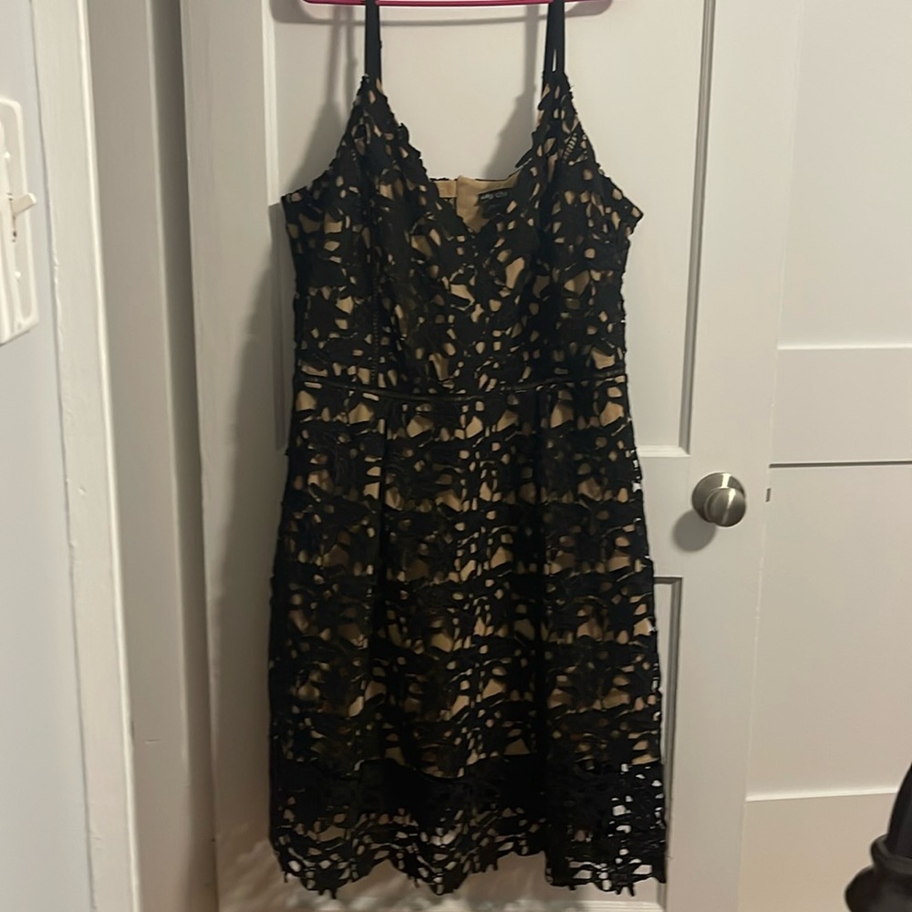 Black lace plus size formal gown with nude underlay